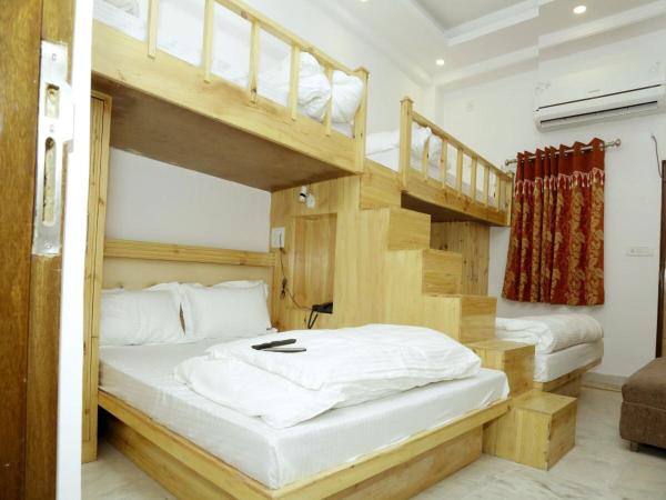 Friends Hostel by Backpackers Heaven- New Delhi Railway Station - Paharganj : photo 1 de la chambre chambre quadruple deluxe