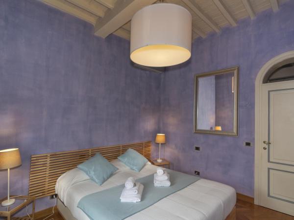 Lauri Loft : photo 2 de la chambre chambre lit king-size avec baignoire spa