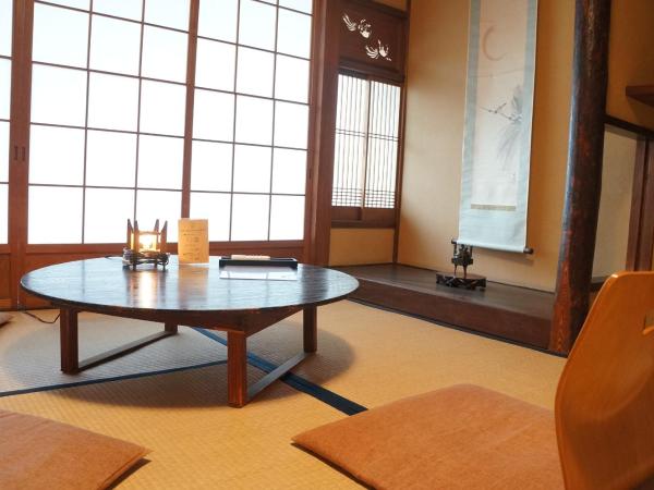 Guesthouse Itoya Kyoto : photo 5 de la chambre chambre triple basique avec salle de bains commune