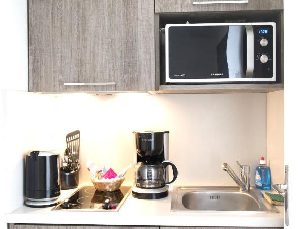 Domitys Paris Plaisance : photo 3 de la chambre studio avec vue sur jardin