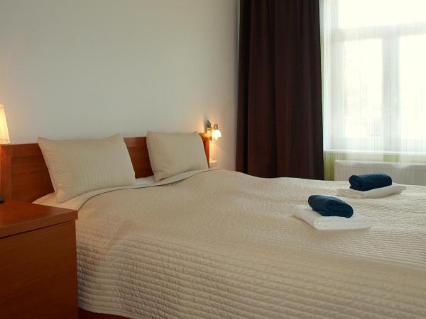 Pension Village : photo 1 de la chambre suite 2 chambres