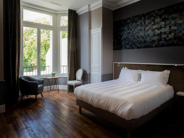 La Cave de l'Avenue de champagne : photo 1 de la chambre chambre double - vue sur jardin