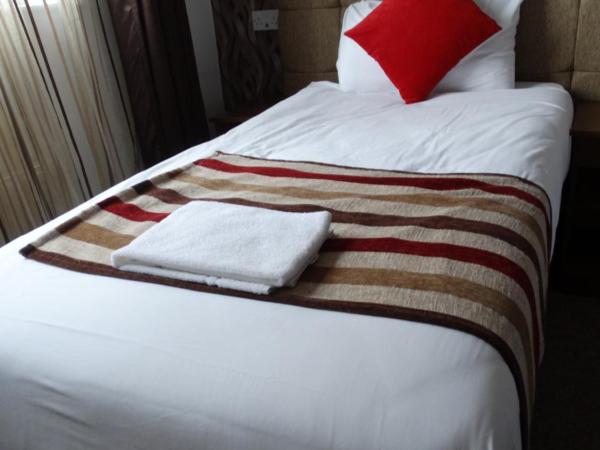 Trivelles Mayfair,stockport : photo 2 de la chambre chambre lits jumeaux