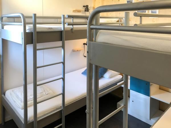 RiverLodge TCS Training & Freizeit AG : photo 2 de la chambre chambre quadruple avec salle de bains commune