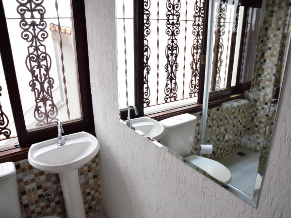 Hotel Alvorada do Sol : photo 2 de la chambre chambre triple