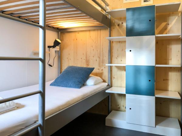 RiverLodge TCS Training & Freizeit AG : photo 3 de la chambre chambre quadruple avec salle de bains commune