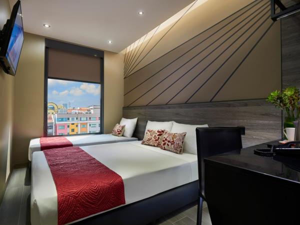 Hotel 81 Orchid : photo 1 de la chambre chambre triple