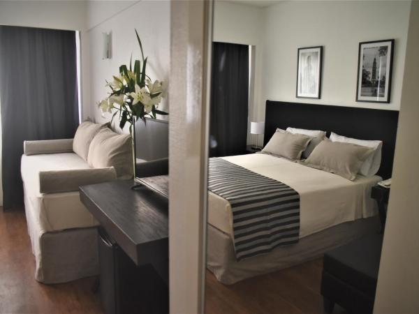 Grand King Hotel : photo 1 de la chambre chambre triple