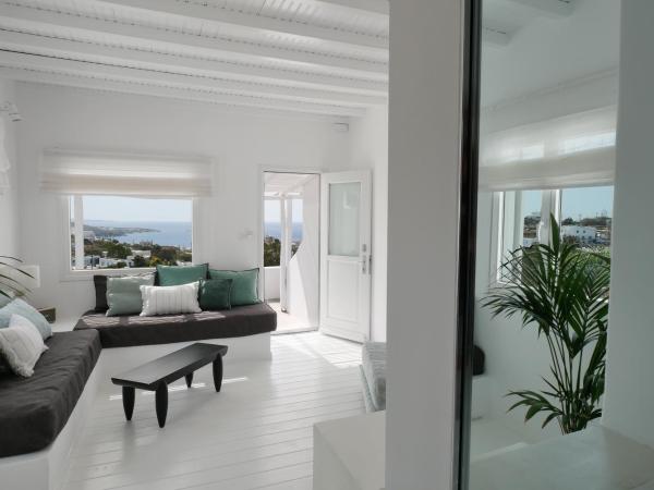 Ostraco Suites : photo 4 de la chambre suite avec bain à remous extérieur - vue sur mer