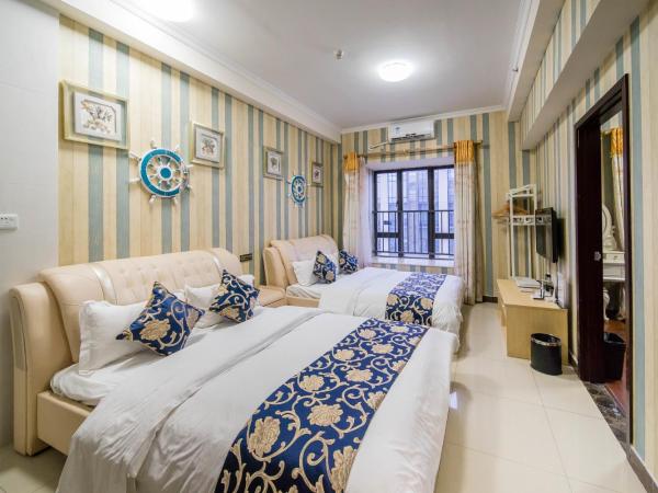 Pazhou Laiste International ApartHotel Canton Fair Complex Branch : photo 1 de la chambre chambre lits jumeaux deluxe - vue sur ville