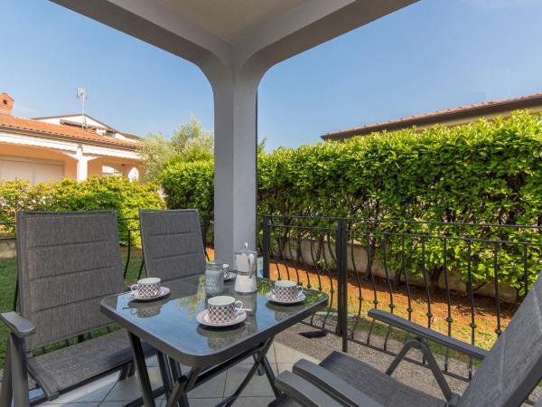 Silver Holiday House : photo 4 de la chambre appartement - vue sur jardin