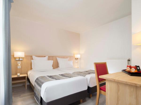 Hôtel Le Compostelle : photo 3 de la chambre chambre lits jumeaux