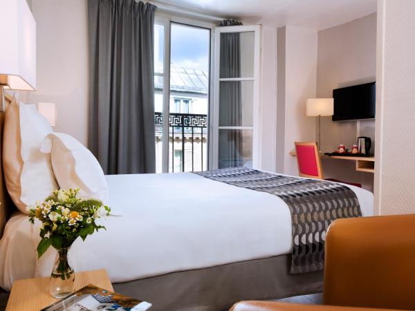 Hôtel Le Compostelle : photo 2 de la chambre chambre double avec baignoire