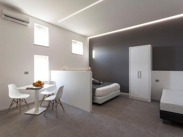 Nostos rooms & Apartments : photo 4 de la chambre studio lit king-size avec canapé-lit