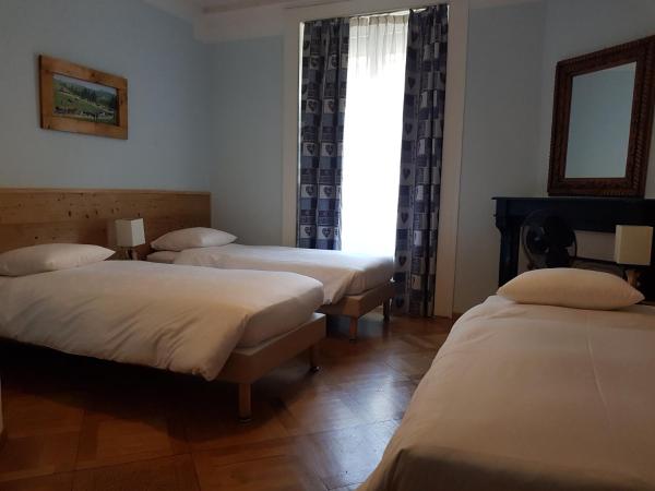 Hotel de Geneve : photo 6 de la chambre chambre triple