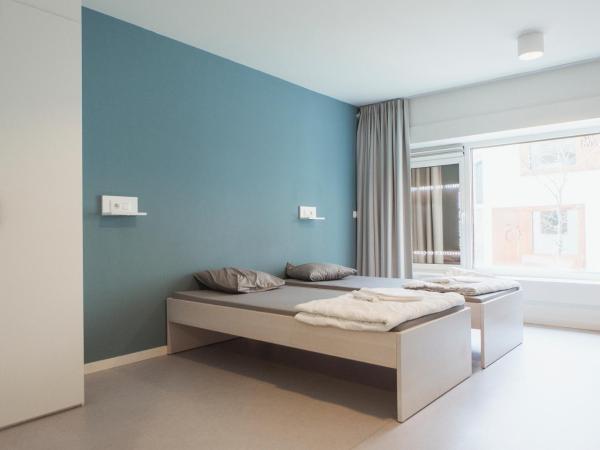 Snuffel Youth Hostel : photo 1 de la chambre chambre lits jumeaux privée