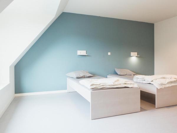 Snuffel Youth Hostel : photo 6 de la chambre chambre lits jumeaux privée