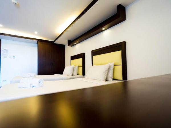 Initial Hua Hin - SHA Plus : photo 9 de la chambre chambre lits jumeaux supérieure