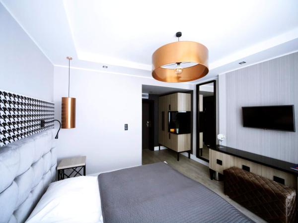 Hotel Pomarańczowa Plaża ex Bursztyn : photo 1 de la chambre chambre double ou lits jumeaux