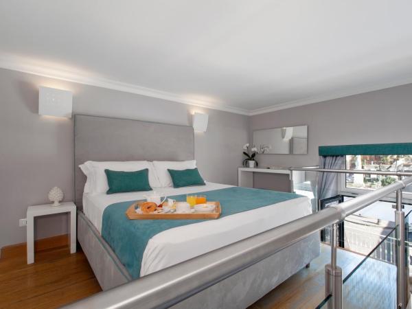 La Piazzetta Guest House : photo 4 de la chambre appartement supérieur en duplex avec terrasse