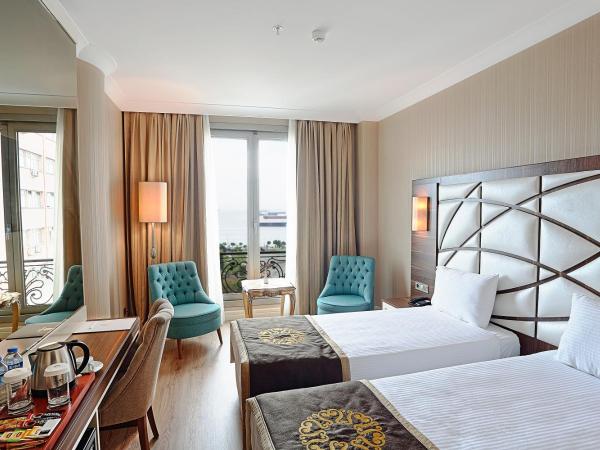 The Grand Mira Business Hotel : photo 2 de la chambre chambre deluxe double ou lits jumeaux