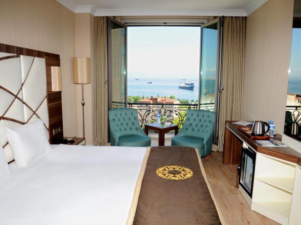 The Grand Mira Business Hotel : photo 3 de la chambre chambre deluxe double ou lits jumeaux