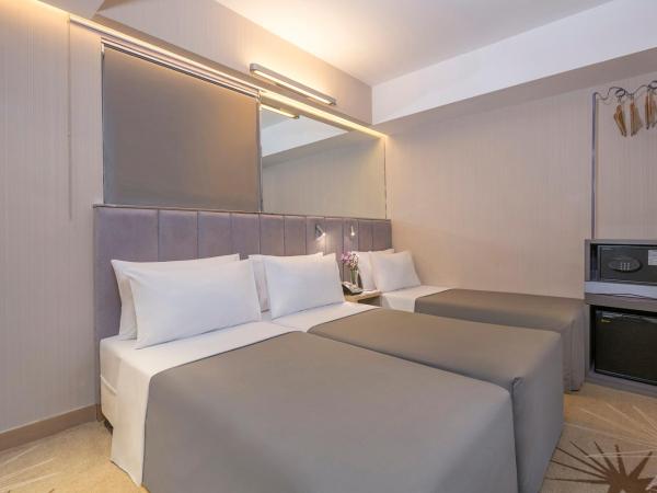 Silka Far East Hotel : photo 2 de la chambre chambre triple