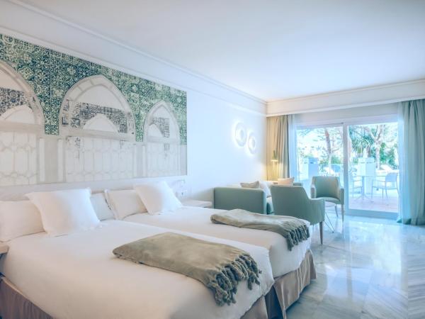 Iberostar Selection Marbella Coral Beach : photo 9 de la chambre chambre lits jumeaux avec accès direct à la piscine semi-privée 
