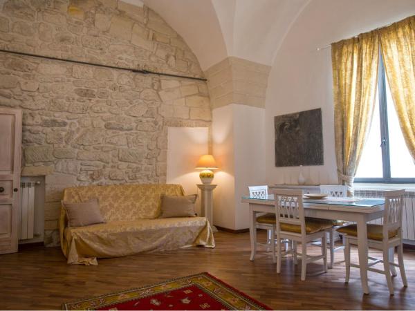 Chiesa Greca - SIT Rooms & Apartments : photo 9 de la chambre suite lit king-size avec terrasse