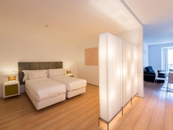 Alfama - Lisbon Lounge Suites : photo 4 de la chambre appartement - vue sur jardin