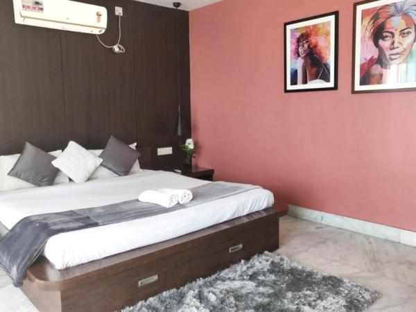 Tatvam Residency : photo 2 de la chambre chambre lit king-size