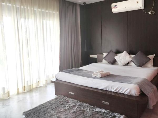 Tatvam Residency : photo 3 de la chambre chambre lit king-size