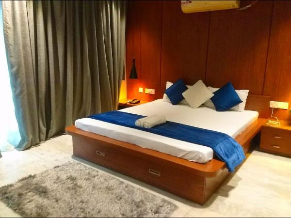 Tatvam Residency : photo 5 de la chambre chambre lit king-size