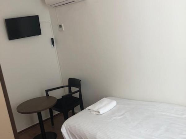 Hotel 55 - City Centre : photo 2 de la chambre chambre simple avec salle de bains privative