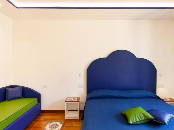 La Casa dell'Orologio - MAIN SQUARE : photo 7 de la chambre chambre quadruple classique