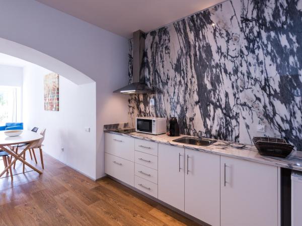 Alfama - Lisbon Lounge Suites : photo 5 de la chambre appartement 1 chambre avec jardin