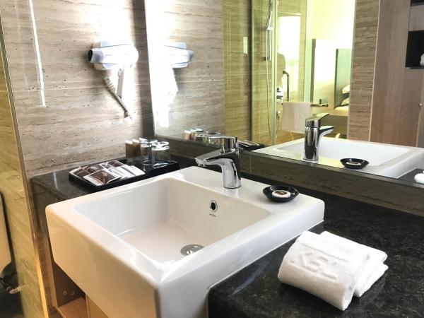 KSL Hot Spring Resort : photo 1 de la chambre chambre lit king-size deluxe