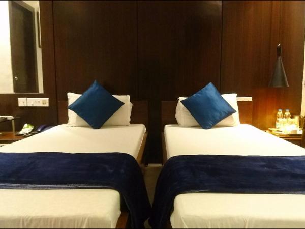 Tatvam Residency : photo 2 de la chambre chambre lits jumeaux deluxe