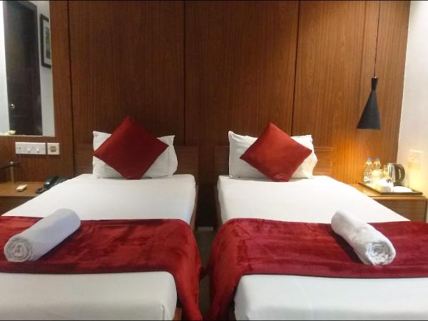 Tatvam Residency : photo 3 de la chambre chambre lits jumeaux deluxe