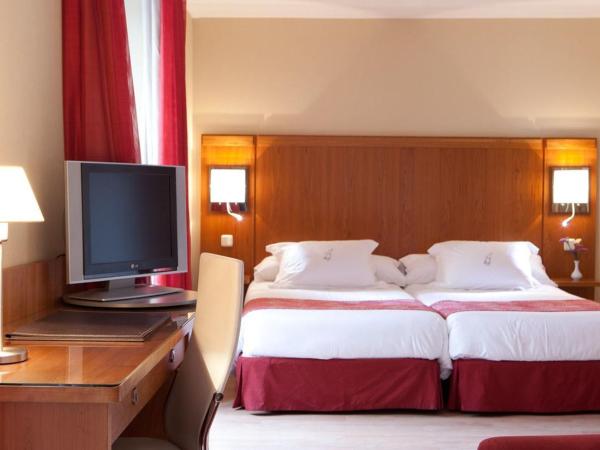 Ateneo Puerta del Sol : photo 1 de la chambre chambre double ou lits jumeaux