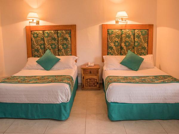 Hotel Posada Quinta Las Flores : photo 7 de la chambre suite double junior