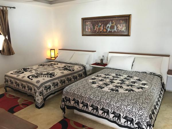 Casa de las Olas Surf & Beach Club : photo 1 de la chambre chambre lits jumeaux spacieuse