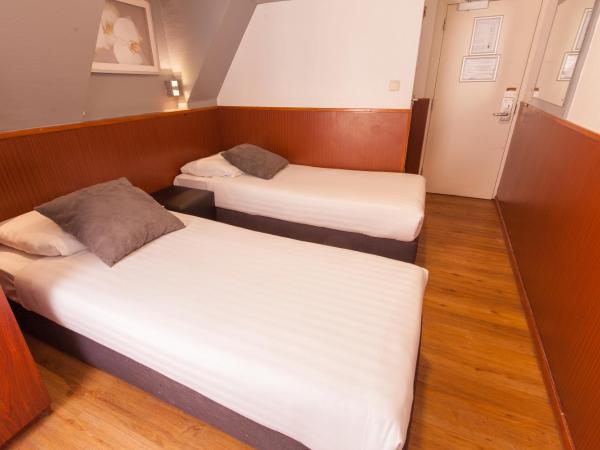 Travel Hotel Amsterdam : photo 2 de la chambre chambre lits jumeaux