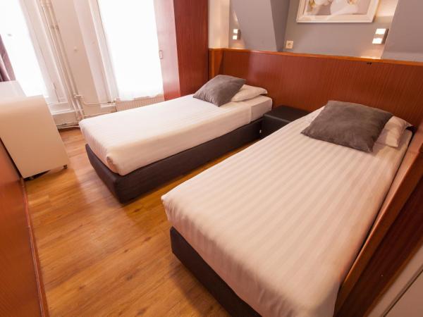 Travel Hotel Amsterdam : photo 3 de la chambre chambre lits jumeaux
