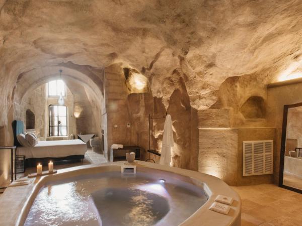 Palazzo Del Duca Hotel & Restaurant : photo 2 de la chambre suite avec jacuzzi