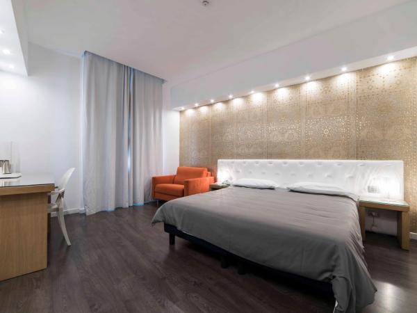 Hotel Montestella : photo 2 de la chambre chambre triple supérieure