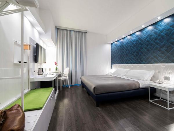 Hotel Montestella : photo 1 de la chambre chambre quadruple deluxe