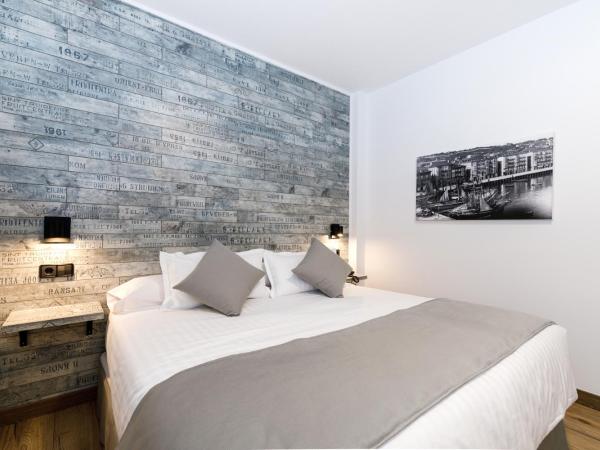 Suite Home Pinares : photo 5 de la chambre chambre double ou lits jumeaux