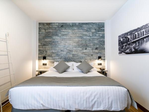 Suite Home Pinares : photo 8 de la chambre chambre double ou lits jumeaux
