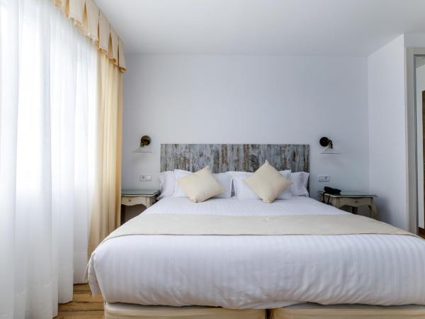 Suite Home Pinares : photo 5 de la chambre chambre double ou lits jumeaux